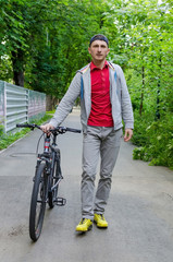 Young man with bicycle