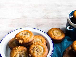 Home made banana muffins on blue napkin. Copy space