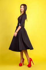 Fototapeta premium girl on a yellow background