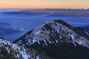 Winter mountains landscape in sunset