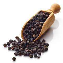 Scoop of black peppers