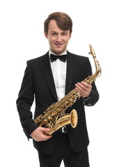 Attractive saxophonist with a saxophone in a suit.