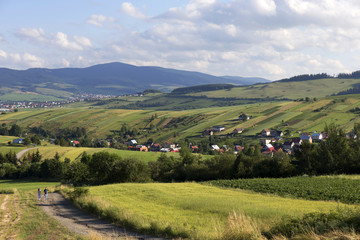 Fototapeta na wymiar Clear green Landscape with little Village from the summer Mountains Magura in Slovakia