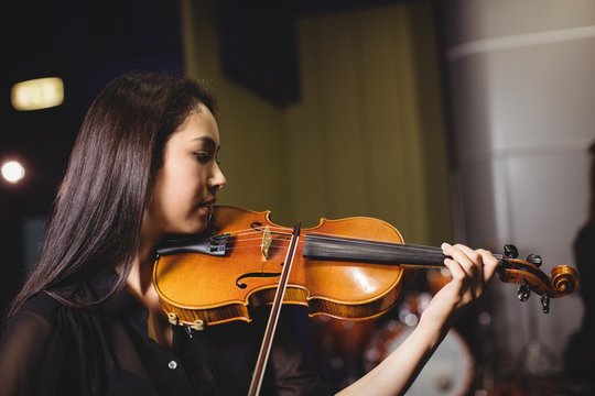 Female student playing violin
