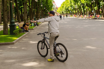 Young man with bicycle