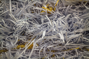 Shredded paper from paper shredder.