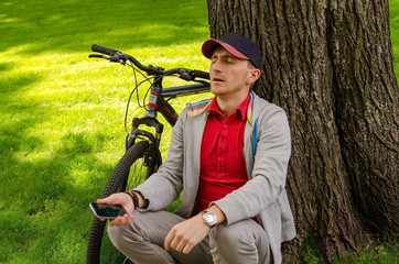 Young man with bicycle