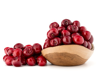 cherry berries in wooden bowl