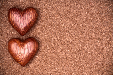 Two wooden hearts on rustic wood background. Valentines days con