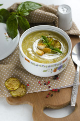 Cream soup with a basil and vegetable marrows  