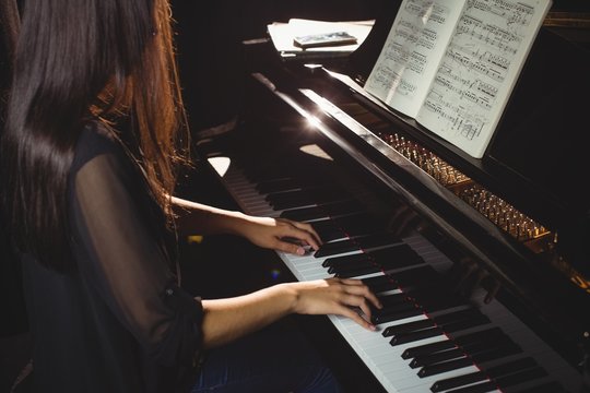 Female student playing piano