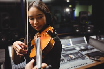 Female student playing violin