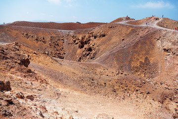 Nea Kameni volcanic island in Santorini, Greece. Horizontal shot