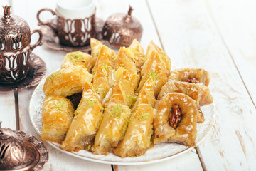  traditional eastern desserts on wooden background