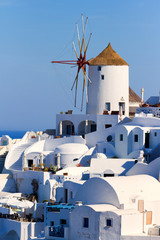 Famous windmill in Oia, Santorini shot in the morning at sunrise