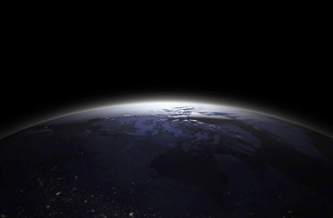 Earth at night as seen from space with blue, glowing atmosphere and space at the top. Perfect for...