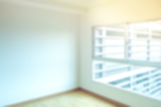 Blur background of empty condominium interior with separate room