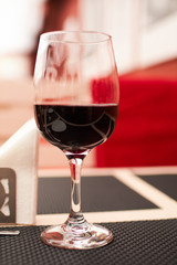 glass of red wine in cafe