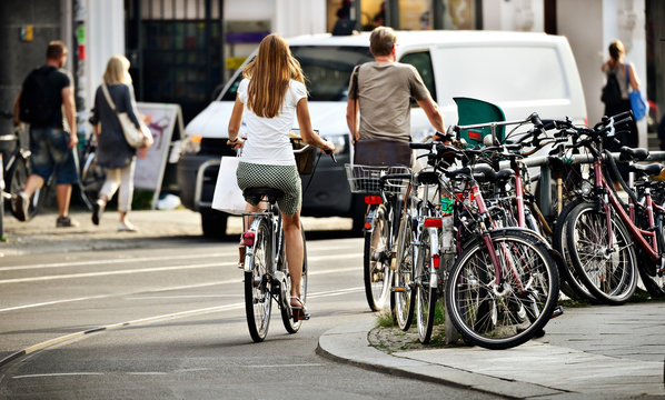 Fototapeta People on bikes in traffic
