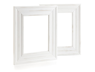 two white vintage styled picture frames isolated with clipping path