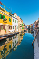 Fototapeta na wymiar VENICE, ITALY - 21 OCTOBER 2016 - Burano, the town of a thousand colors, an enchanted island in the heart of the Venice lagoon