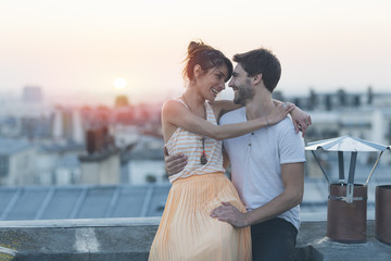 Young couple on the roofs of Montmartre, Paris
