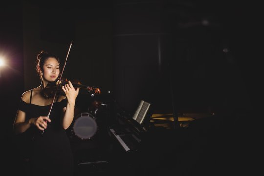 Female student playing violin