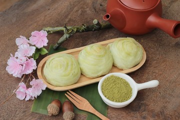 Festival moon cake - Chinese cake and green tea powder.