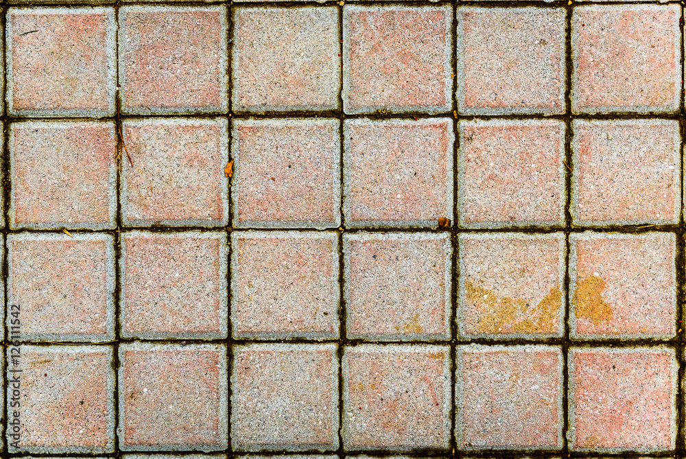 Poster concrete or cobble gray pavement slabs or stones.