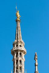Fototapeta na wymiar Madonnina, statue of the Virgin Mary. Duomo di Milano (Milan Cathedral) Lombardy, Italy