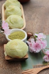 Obraz na płótnie Canvas Festival moon cake - Chinese cake and green tea powder.