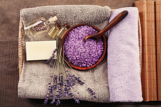 Beautiful spa composition with lavender on wooden table
