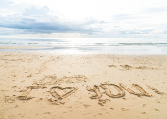 Message i love you on the sand