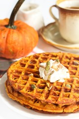 Pumpkin waffles / Autumn Breakfast on white background, selective focus