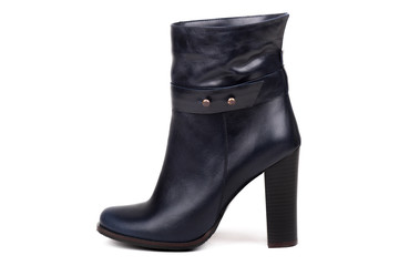 Stylish leather boots shot in studio, isolated on white