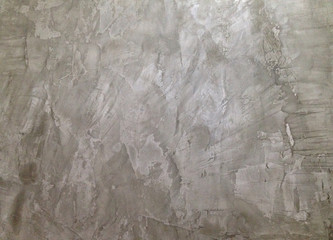 Texture of exposed raw concrete wall.