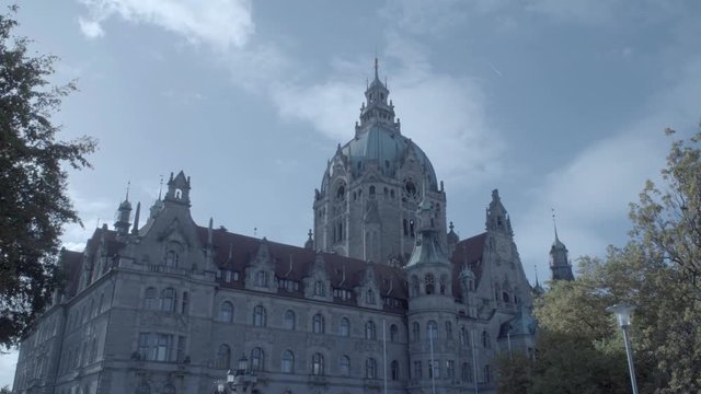 New Town Hall in Hanover, Germany. Zoom out to front of the building in 4K and S-Log3. Long shot. Autumn. Neues Rathaus Hannover.