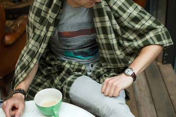 Young man drinking hot coffee