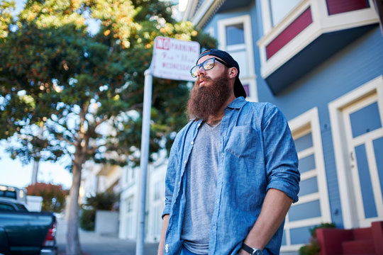 Hipster With Long Beard On Sidewalk In San Francisco