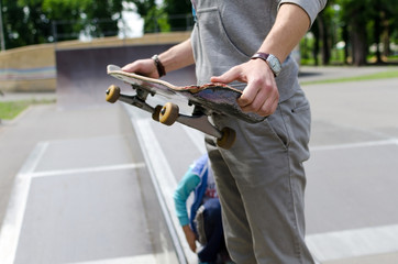 Young man with the skateboard 