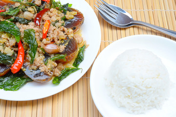 Fried basil with pork and preserved egg
