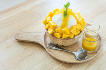 Bingsu ( Korea food) with mango on table