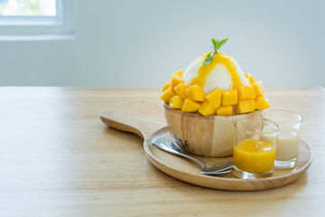 Bingsu ( Korea food) with mango on table