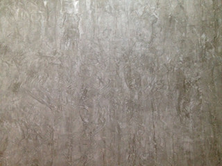 Texture of Raw grey exposed concrete wall.