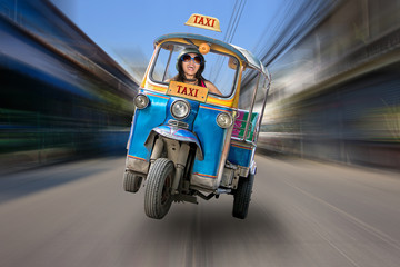 traditional tricycle taxi rides on the streets of Bangkok - obrazy, fototapety, plakaty