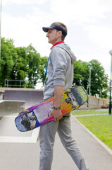 Young man with the skateboard © retoncy