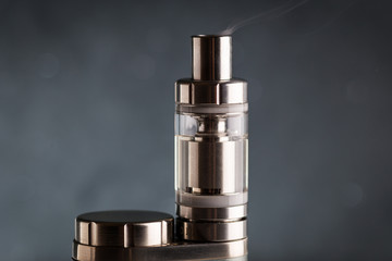 electronic cigarette, vape with a smoke on a black background