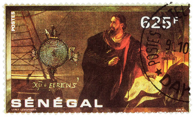 Christopher Columbus with a map on postage stamp