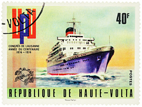 Old cruise ship on postage stamp
