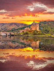 Foto op Canvas Eilean Donan Castle against sunset in Highlands of Scotland © Tomas Marek